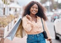 Black woman, shopping and bags with smile in the city for sale, discount and urban outdoors. Portrait of happy African Royalty Free Stock Photo