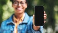 Black Woman Showing Cellphone Empty Screen Standing Outdside, Mockup, Panorama