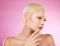 Black woman, skincare beauty and makeup in studio with short blonde hair, hand and face by pink background. African gen Royalty Free Stock Photo