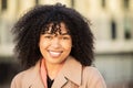 Black woman, smile portrait and city travel while happy outdoor on London street with freedom. Face of young model Royalty Free Stock Photo