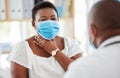 Black woman, sore throat and face mask, doctor and patient in hospital, medical examination and symptoms. Healthcare Royalty Free Stock Photo