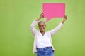 Black woman, speech bubble and portrait for poster, space or mockup with opinion by green wall background. African girl