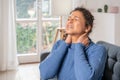 Black woman suffering neckache because of bad posture