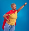 Black woman, superhero cape and flying in studio, blue background and pop culture fashion. Happy female model, cosplay