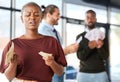 Black woman, unequal pay and confused by wages, paycheck and quote in office, frustrated and annoyed. Angry, woman and Royalty Free Stock Photo