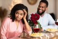 Black Woman On Unsuccessful First Date In Restaurant Royalty Free Stock Photo