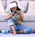 Black woman, video games and virtual reality gaming on home floor for metaverse, ar and ux. Gamer person with console