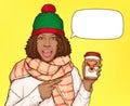 Black woman in warm clothes with cup of coffee