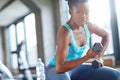 Black woman, weight lifting and portrait in gym for workout with dumbbell, fitness challenge and strong muscle Royalty Free Stock Photo