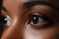 Black woman wide opened left eye Royalty Free Stock Photo