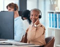 Black woman working in call center, customer service or online help desk office on conversation with client or customer Royalty Free Stock Photo