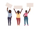 Black women standing together and holding blank banner. People taking part in parade. Female protesters or activists