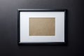 Black wood frame on black wall Royalty Free Stock Photo