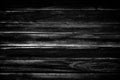 Black wooden background. Blackboard. Grunge texture