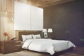 Black and wooden bedroom, posters, side toned Royalty Free Stock Photo