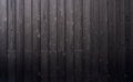 Black wooden board texture background, black wood floor from fire. Black smooth wooden planks background. Burnt planks wall. Royalty Free Stock Photo