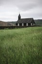 Black wooden church Budakirkja near the village Budhir in Iceland