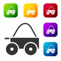 Black Wooden four-wheel cart with hay icon isolated on white background. Set icons in color square buttons. Vector Royalty Free Stock Photo