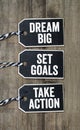 Black wooden hang tag with dream big, set goals and take action