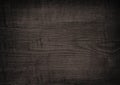 Black wooden plank, tabletop, floor surface or chopping, cutting board. Royalty Free Stock Photo