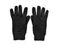 Black woolen gloves on snow Royalty Free Stock Photo