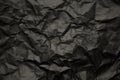 Black wrinkled paper texture. Royalty Free Stock Photo