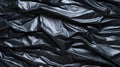Black wrinkled plastic wrap texture. Crumpled dark thin plastic background. Generative AI Royalty Free Stock Photo