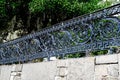 Black Wrought Iron Scrollwork Fence