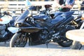 Black Yamaha motorcycle in a parking lot near the 300th anniversary park of St. Petersburg Royalty Free Stock Photo