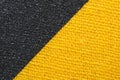 Black and yellow fabric texture. knitted textile close up. woven background Royalty Free Stock Photo