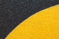 Black and yellow fabric texture. knitted textile close up. woven background Royalty Free Stock Photo