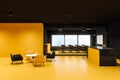 Black and yellow office reception and lounge