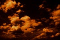 Black yellow orange skies. Dramatic night sky with clouds. Background with space for design. Royalty Free Stock Photo