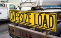 Oversize load sign on the back of big rig semi truck tractor on Royalty Free Stock Photo