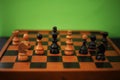 Black and yellow pieces on a chessboard Royalty Free Stock Photo