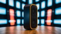 A black and yellow speaker sitting on a table in front of some lights, AI Royalty Free Stock Photo