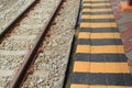 Black and Yellow in train station signal danger