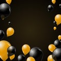 Black and yellow transparent helium balloons on dark background. Flying latex balloons.