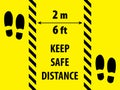 Black and yellow warning tapes with text Keep Safe Distance and trace shoes on a yellow background. Social Distance rule. Preven