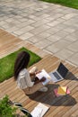 Black young woman student learning using laptop studying outside campus. Royalty Free Stock Photo