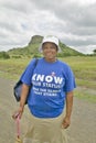 Black Zulu woman with t-shirt about AIDS infection, at the scene of the Anglo Zulu battle site of January 22, 1879. The great