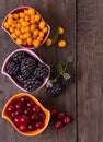 Blackberry, cranberry and buckthorn top view Royalty Free Stock Photo