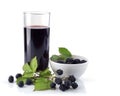 Blackberry in plate and glass juice Royalty Free Stock Photo