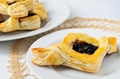 Blackberry puff on white plate