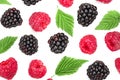 Blackberry and raspberry with leaves isolated on white background. Top view. Flat lay pattern Royalty Free Stock Photo
