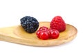 Blackberry, red currants and raspberry on wooden Royalty Free Stock Photo