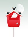 Blackbirds on mailbox in winter