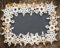 Blackboard blank framed in wooden snowflakes