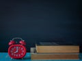 Blackboard, books and watches. Royalty Free Stock Photo