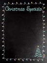 Blackboard or Chalkboard menu with the words Christmas Specials